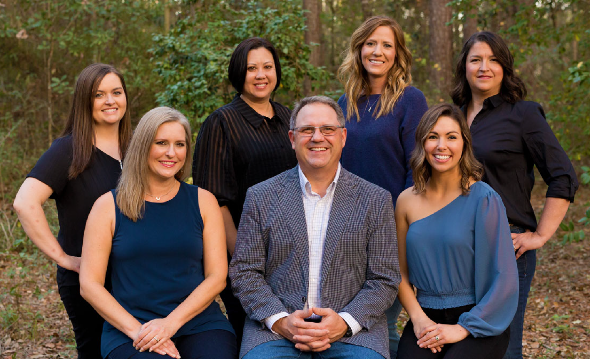 The Smile Gulf Coast team &mdash; Drs. Randy and Ross Buntyn with hygienists and coordinators